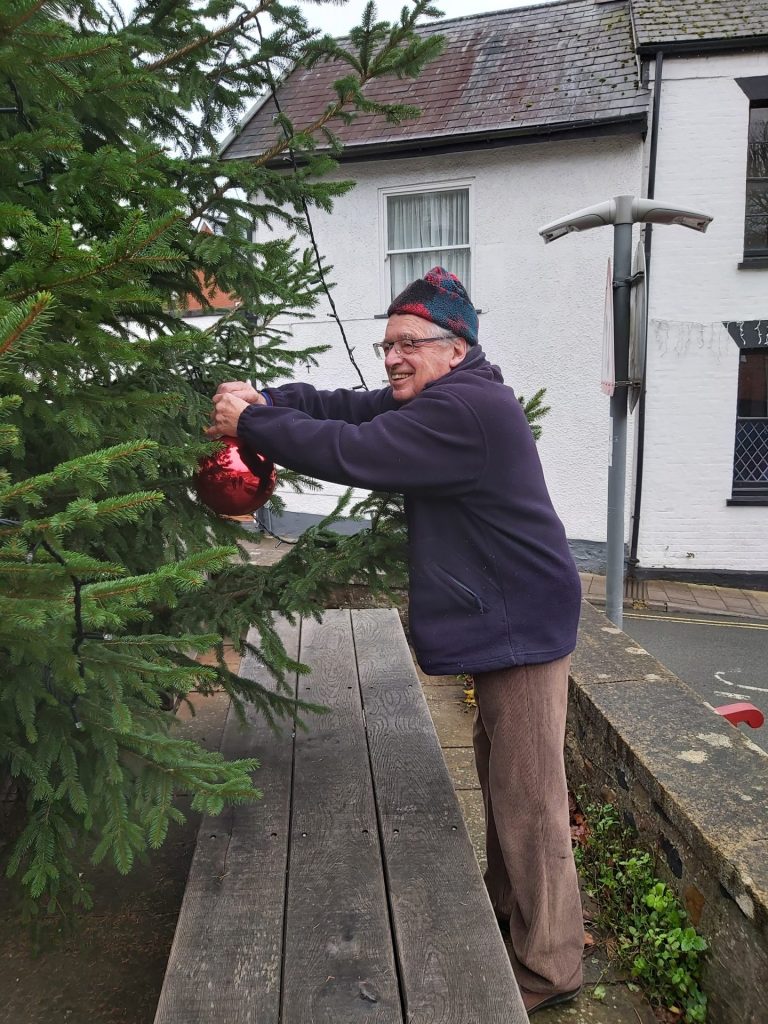 Ottery resident Richard Coley adding the first bauble